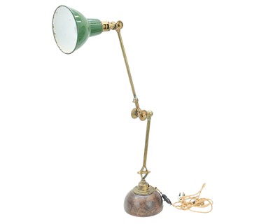 Lot 680 - A rare Admiralty Patent 'daisy cog' lamp.