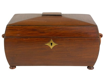 Lot 42 - A 19th century partridge wood tea caddy of sarcophagus form.