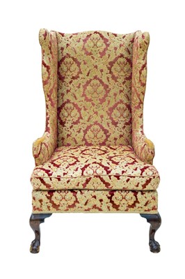 Lot 829A - A George III style mahogany wing armchair.
