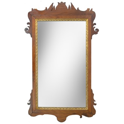 Lot 748 - A George III style walnut fretwork wall mirror.