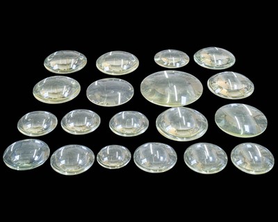 Lot 115 - A collection of 19 circular magnifying lenses in various sizes.