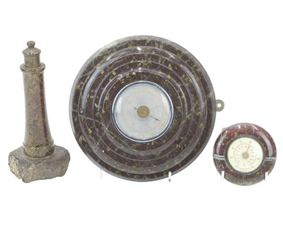 Lot 39 - A Cornish serpentine turned serpentine model of a lighthouse.