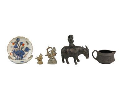 Lot 452 - Two Burmese bronze opium weights.