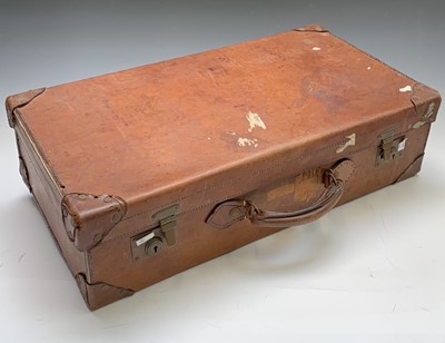 Lot 2831 - A handsome chesnut leather suitcase 66x35x18cm