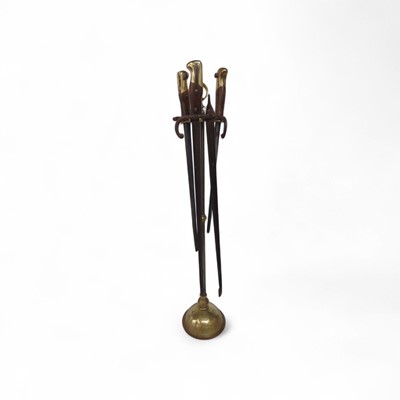 Lot 168 - A 20th century four-piece fireside companion set, made up from late 19th century French bayonets