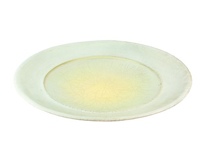 Lot 510 - John Dunn (British b. 1944) A raku pottery charger.
