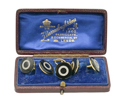 Lot 24 - An Art Deco 18k (tested) black onyx and diamond-set three-piece dress shirt set.