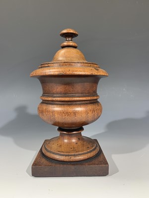 Lot 115 - A Victorian treen urn shape tobacco jar....