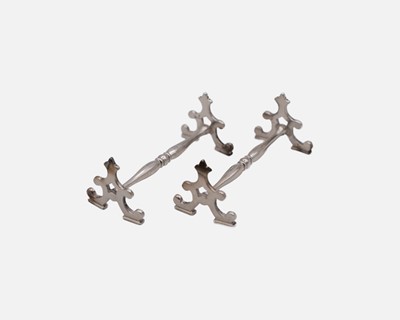 Lot 246 - Two late Victorian silver knife rests by Stokes & Ireland Ltd.