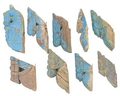 Lot 82 - A collection of Indian horse head carvings.