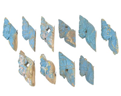Lot 92 - A collection of Indian horse head carvings.