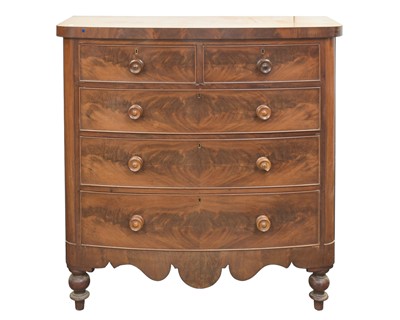 Lot 918 - A Victorian figured mahogany bow front chest.
