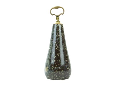 Lot 53 - A Cornish serpentine door stop with brass handle.