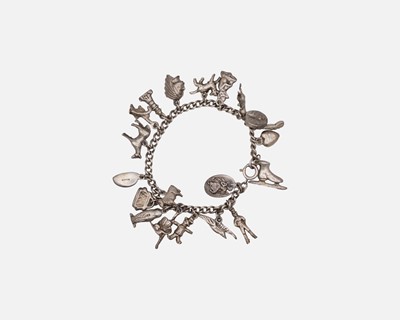 Lot 72 - A silver charm bracelet.