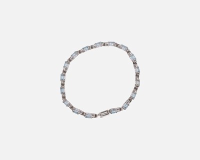 Lot 55 - A 925 silver blue topaz set bracelet.