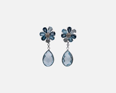 Lot 77 - A pair of 925 silver blue topaz set flower head design earrings with detachable drops.