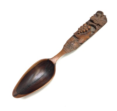Lot 305 - A 19th century continenal carved fruitwood...
