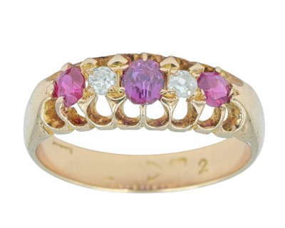 Lot 114 - An antique 18k diamond and ruby set five-stone ring.