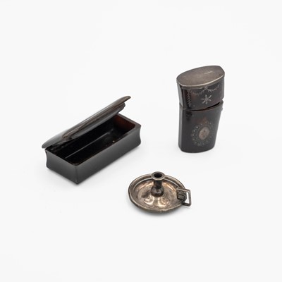 Lot 241 - A Georgian tortoiseshell piqué scent bottle holder, a horn snuff box & a silver miniature chamber stick.