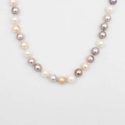 Lot 100 - A multi-coloured cultured pearl necklace, strung to a silver pavé diamond set lobster clasp.