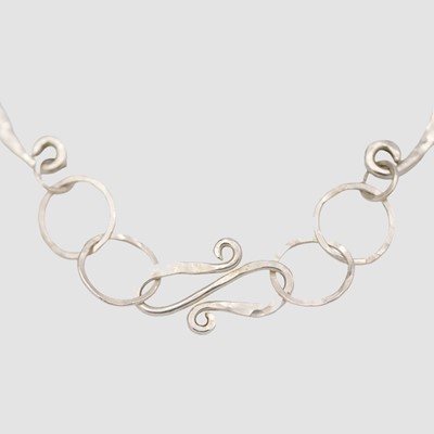 Lot 84 - A Contemporary silver and yellow metal mounted bird pendant necklace.