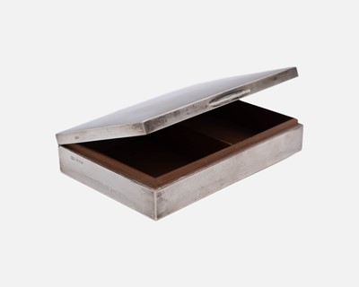 Lot 226 - A silver desk top cigarette box by Padgett & Braham Ltd.