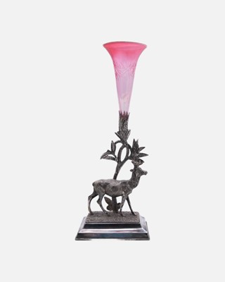 Lot 145 - A silver-plated epergne, cast with a deer and cranberry glass.