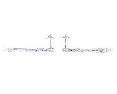 Lot 9 - A fine pair of Art Deco 18k and platinum diamond set drop pendant earrings.