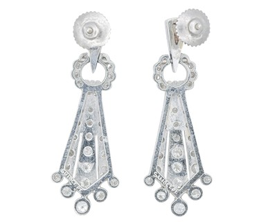 Lot 9 - A fine pair of Art Deco 18k and platinum diamond set drop pendant earrings.