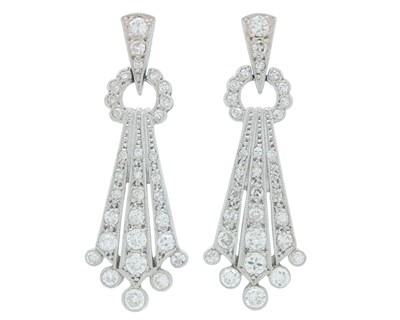 Lot 9 - A fine pair of Art Deco 18k and platinum diamond set drop pendant earrings.