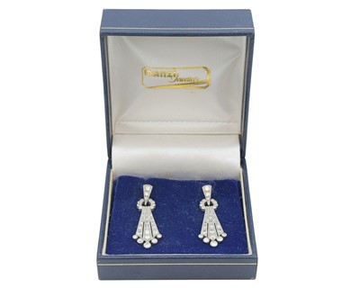 Lot 9 - A fine pair of Art Deco 18k and platinum diamond set drop pendant earrings.