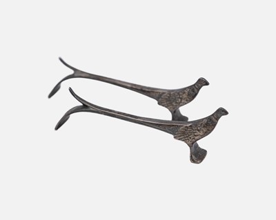 Lot 186 - A pair of modern silver pheasant shaped knife rests by Bishton's Ltd.