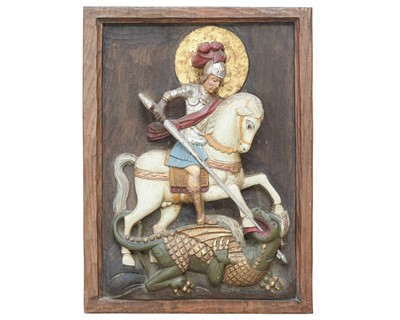 Lot 111 - A carved relief panel of St George and the dragon.