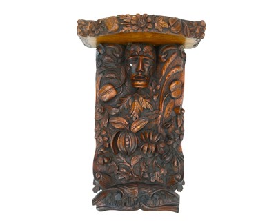 Lot 866 - A carved oak corbel or bracket.