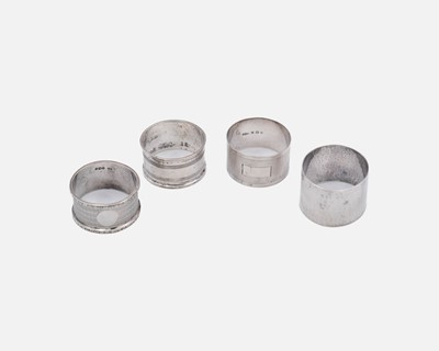 Lot 181 - A silver napkin ring by Albert Edward Jones.
