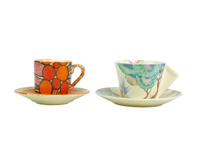 Lot 702 - A Clarice Cliff 'Berries Café au Lait' pattern coffee can and saucer.