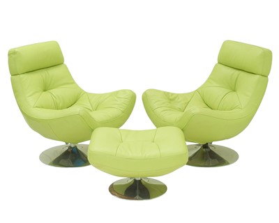 Lot 729 - A pair of contemporary lime green leather swivel chairs on chrome stands.