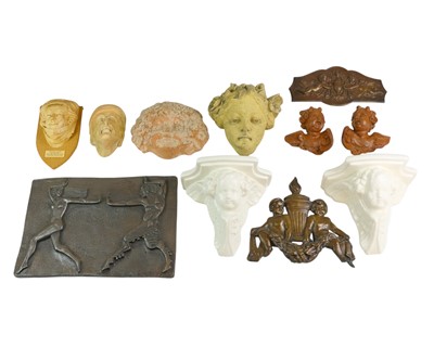Lot 161 - A collection of wall plaques and sconces.