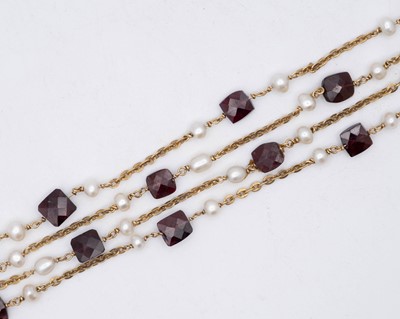 Lot 67 - A silver-gilt cultured pearl and garnet bead neck chain.