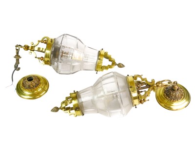 Lot 751 - A pair of brass and cut glass hanging light pendants.