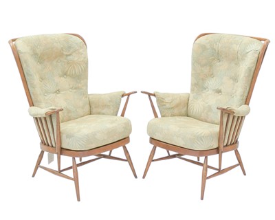 Lot 602 - A pair of Ercol 1913 Evergreen easy armchairs.