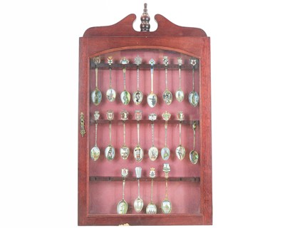 Lot 469 - A collection of 20 decorative enamel teaspoons.