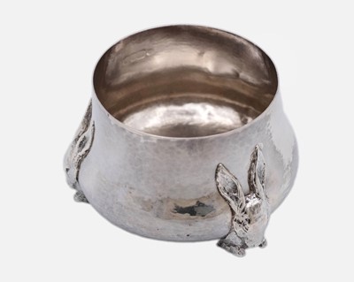 Lot 118 - An unusual Edwardian Arts & Crafts silver bowl with rabbit head supports by William Lawrence Connell.