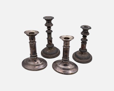 Lot 191 - Two pairs of Old Sheffield plated telescopic candlesticks.