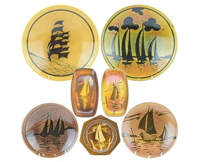 Lot 688 - A Poole Pottery 'Aegean' charger with sailing boat decoration by Laura Wills.
