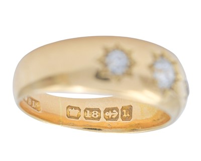 Lot 14 - A Victorian 18k hallmarked gold gypsy ring with three diamonds.