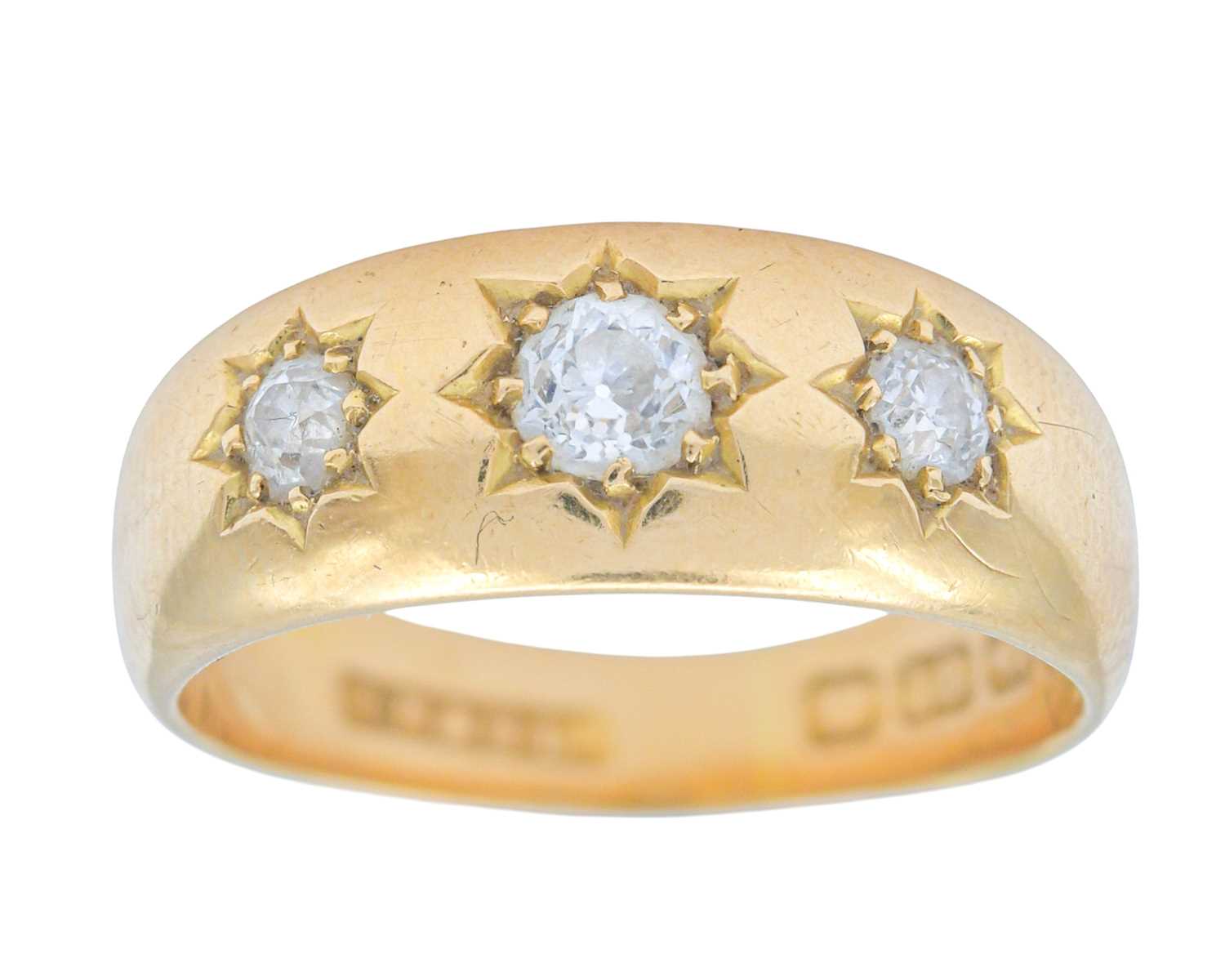 Lot 14 - A Victorian 18k hallmarked gold gypsy ring with three diamonds.
