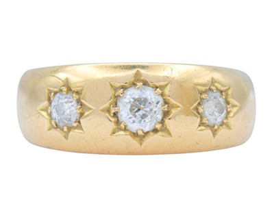 Lot 14 - A Victorian 18k hallmarked gold gypsy ring with three diamonds.
