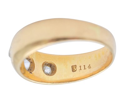 Lot 14 - A Victorian 18k hallmarked gold gypsy ring with three diamonds.