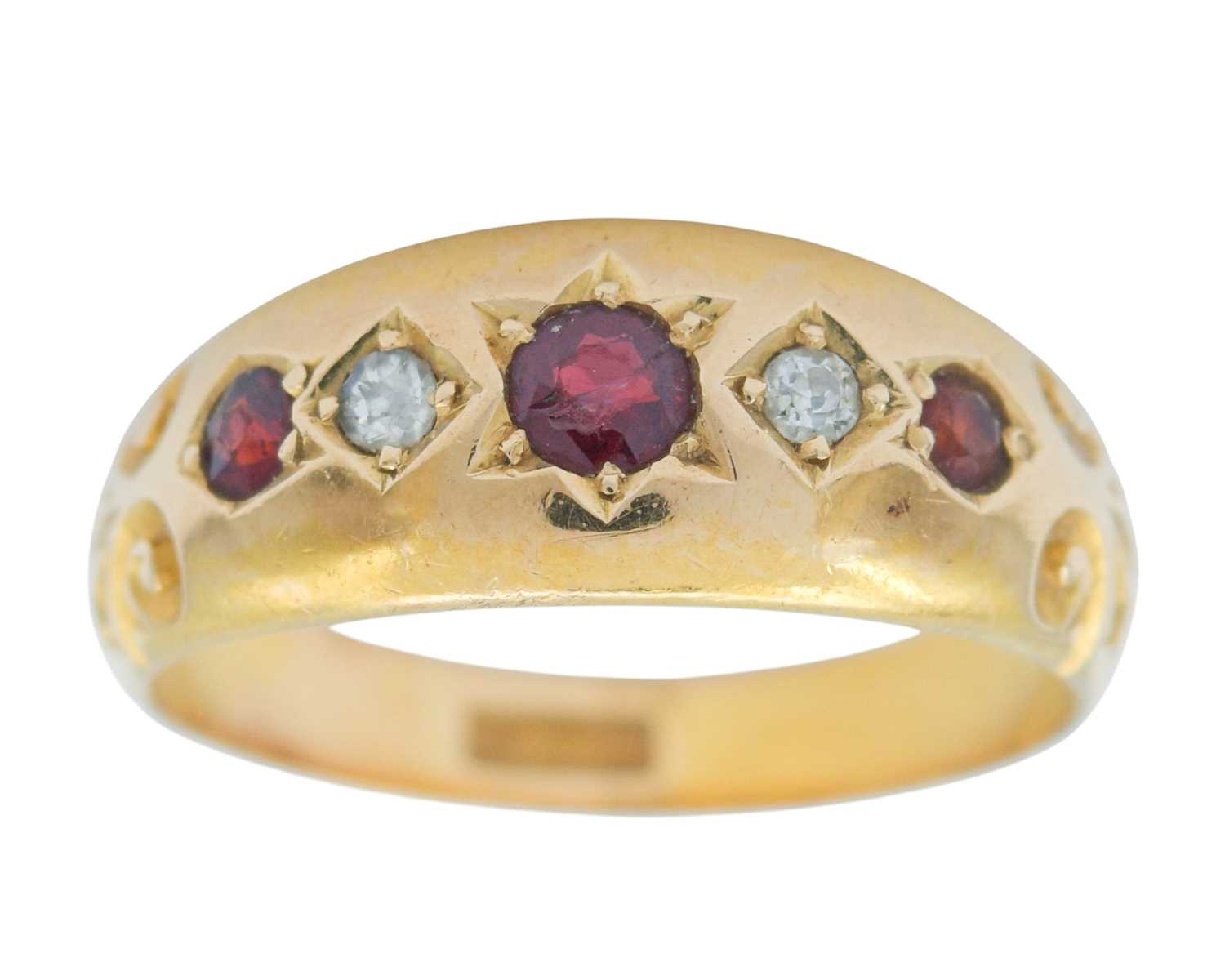 Lot 19 - A Victorian 18k diamond and garnet set five-stone gypsy ring.